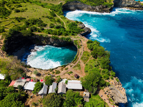 Stunning coastal landscape with cliffs and natural bridge at Broken Beach, Bali