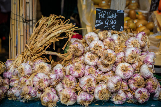 Purple garlic at a vegetable stand at the farmers market in Nice, France