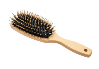 Wooden hairbrush isolated on transparent background