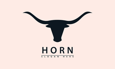 Elegant, curved bull head logo in silhouette. Represents authority, wildness, and nature. Clean design for premium or traditional brands.