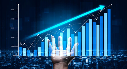 A visual representation of growth in business with a hand reaching towards an upward graph. The...