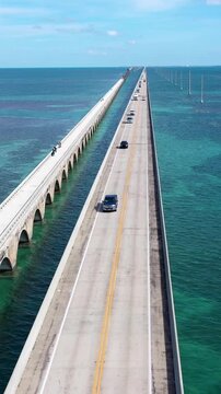 Aerial shot of the Seven Mile Bridge in Florida which connects several of the Florida Keys on the way to Key West. Vertical Video.