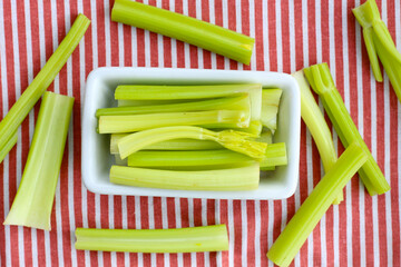 Raw green organic celery sticks