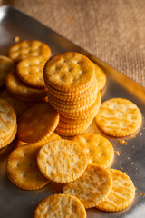 Round Crackers Snack.
A close-up photo of round crackers. Perfect for food, snack, bakery, or cooking-related projects.