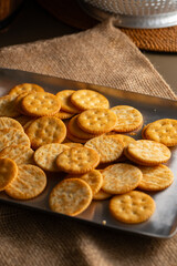 Round Crackers Snack.
A close-up photo of round crackers. Perfect for food, snack, bakery, or cooking-related projects.