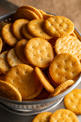 Round Crackers Snack.
A close-up photo of round crackers. Perfect for food, snack, bakery, or cooking-related projects.
