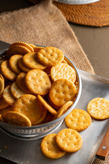 Round Crackers Snack.
A close-up photo of round crackers. Perfect for food, snack, bakery, or cooking-related projects.