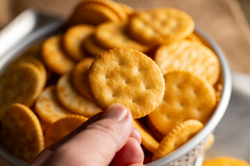 Round Crackers Snack.
A close-up photo of round crackers. Perfect for food, snack, bakery, or cooking-related projects.