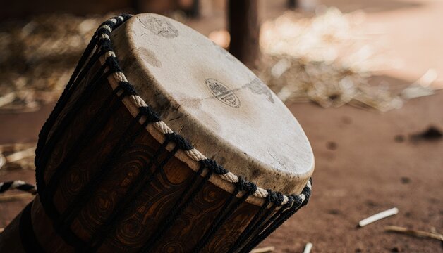 Rhythmic vibes from an artisan drum in a sunlit workshop surrounded by earthy materials Generative AI