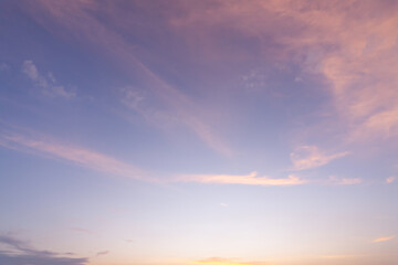 Beautiful morning or evening blue and orange sky with cloudy while sunsets or sunrises taken at the sea used as natural blackground texture