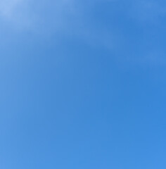 Low angle view and full frame of beautiful light blue sky without clouds in the afternoon on sunny...