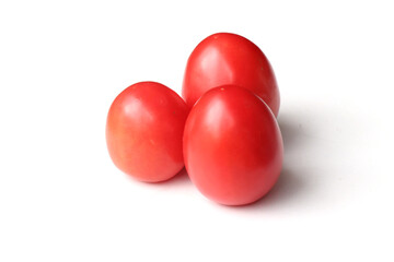 Ripe red tomatoes on white background