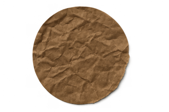 Crumpled brown paper circle with texture and rough torn edge isolated on transparent background