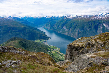 Obraz premium Stunning aerial view of Geirangerfjord and mountain peaks