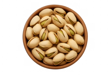 Pistachio nuts in shell filling earthy bowl, healthy snack, top view on transparent background