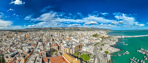Aerial view of Manfredonia on the Adriatic. From ancient Siponto's ruins to the robust medieval...