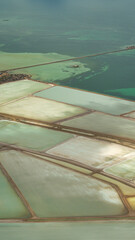 Obraz premium Aerial view of colorful salt ponds and evaporation fields in Shark Bay, Western Australia