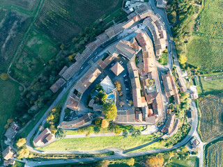 Aerial top down view of Monterchi, Tuscan hilltop citadel where Medieval Walls Meet Renaissance Masterpiece