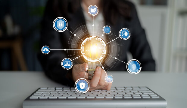 A businesswoman presents a glowing sphere surrounded by digital security icons, symbolizing innovation and data protection in a modern workplace setting. Crux