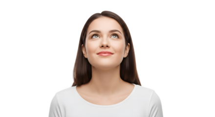 Young woman looking upwards with a hopeful expression on her face.