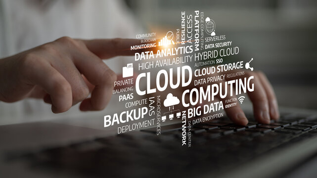 A close-up image of a business professional hand engaging with cloud computing terms, illustrating concepts like data analytics and storage for effective enterprise solutions. Tessel