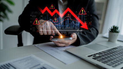 Economic caution visualized with fluctuating market graph, alert symbols, and negative data trends....