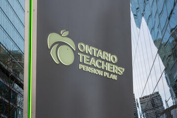 Fototapeta premium Toronto, ON, Canada - November 8, 2025: The sign of Ontario Teachers' Pension Plan is seen at 160 Front St W in Toronto, ON, Canada. The Ontario Teachers' Pension Plan (OTPP) is an independent corpora