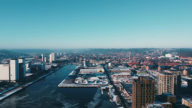 aerial pull shoot of winter view of Fjordenhus in Vejle, Denmark