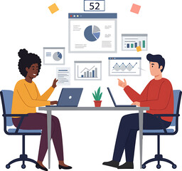 Two People Collaborating at Desk with Laptops and Data Charts Discussing Business.