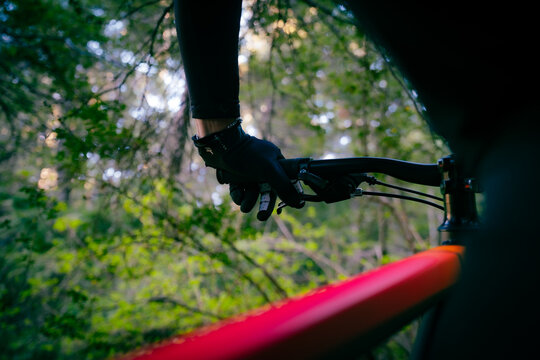 Cyclist's Hand on Handlebar Gripping for Control