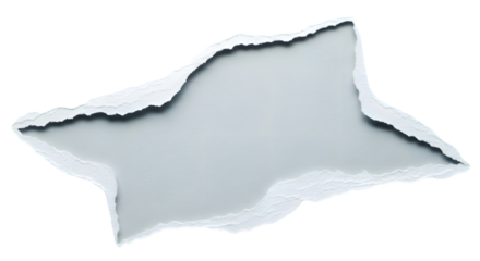 Torn paper with rough edges against a black background creating a dramatic contrast and negative space