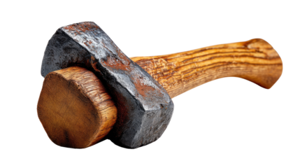 Hammer and Wooden Block: A weathered hammer rests atop a solid wooden block, symbolizing strength, precision, and the essence of craftsmanship.
