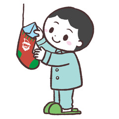 靴下に手紙を入れる男の子のイラスト