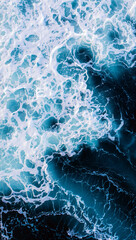 Vibrant waves crash against dark ocean water, creating dynamic patterns of white foam. The scene captures the beauty of nature during early morning hours. Generative AI.