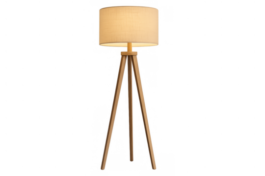 Modern tripod floor lamp illuminating a room, featuring a beige fabric shade and a light wooden stand for home decor