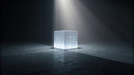 Single luminous cube with the word Elite illuminated by a strong spotlight in a dark, minimalist environment.