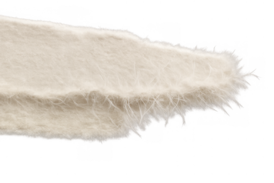 White fluffy angora or faux fur fabric close up showcasing soft texture with ragged edge on transparent background