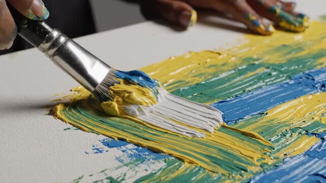 Expressive Strokes A Vibrant Painting Process in Action.