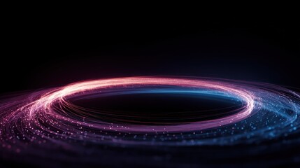 Obraz premium A vibrant, circular light trail with a central point of light, emitting a pink and blue hue, against a dark background. 