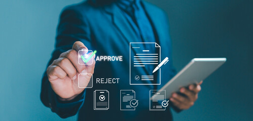 Businessman using digital approval system with document verification and electronic signature icon, representing online workflow, contract management, e-approval, and business process automation.
