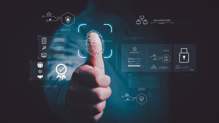 Businessman using digital fingerprint scan for biometric authentication and cybersecurity system, data protection, privacy technology, and secure network access concept for business security.