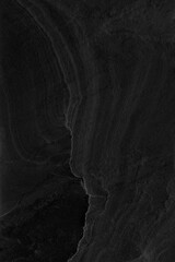 Dark grey black slate background or texture.