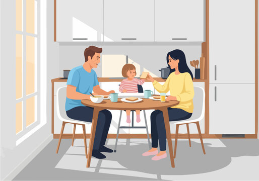 A family enjoys breakfast together in a bright and modern kitchen setting.