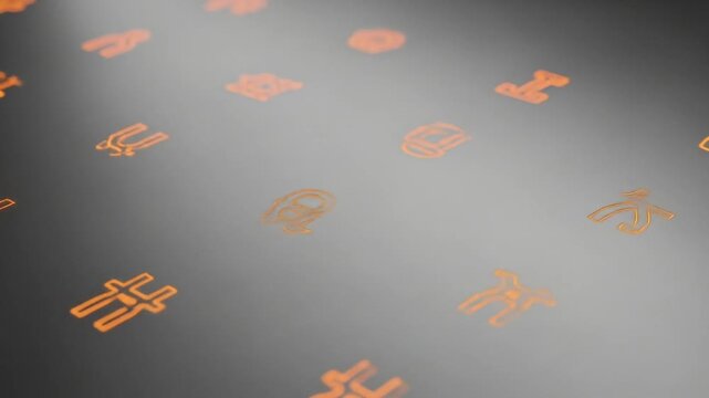 Close-up view of a textured surface with an orange pattern of various industrial tools and symbols.