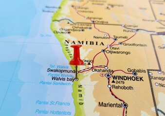 Obraz premium View of Walvis Bay, City and harbour in Erongo Region, Namibia, on a geographical map of Africa, marked with red pushpin