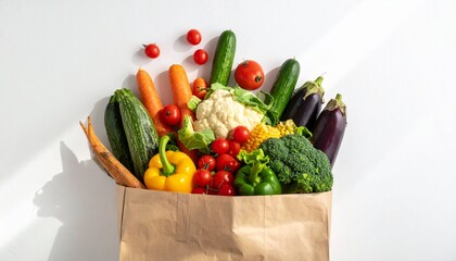 A bountiful array of colorful, farm-fresh organic vegetables and ripe fruits overflowing from a brown paper grocery bag, symbolizing healthy eating and sustainable market shopping