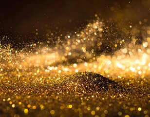 Close-up of gold glitter particles creating a shimmering, bokeh effect