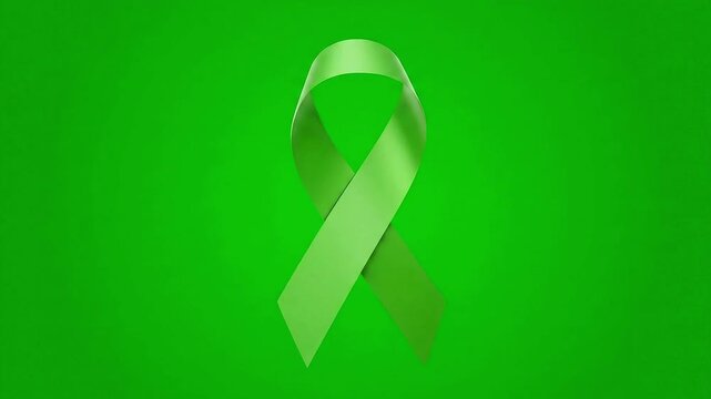 Elegant green ribbon unfurls against a vibrant green backdrop ideal for St Patrick's Day promotions