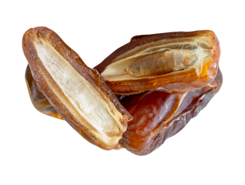 Ripe dried date palm fruits with halves in stack isolated with clipping path in png file format. Concept of iftar food in Ramadan month for Muslims