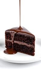 Chocolate sauce cascading down a rich, dark chocolate cake slice on a white plate
